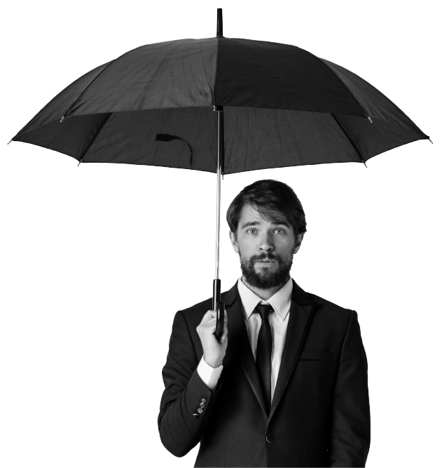man in suit holding umbrella